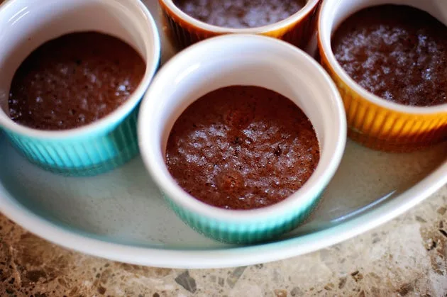 Pioneer Woman baked fudge in ramekins with a crusty chocolate top and soft gooey center